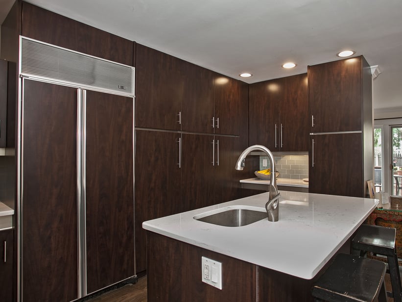 Modern Kitchen with Chocolate Pear Cabinets and Glass Tile Backsplash