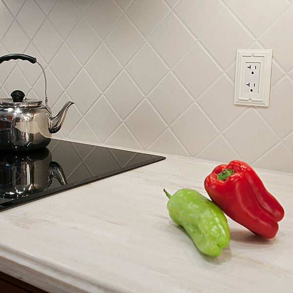 Routed Corian Backsplash